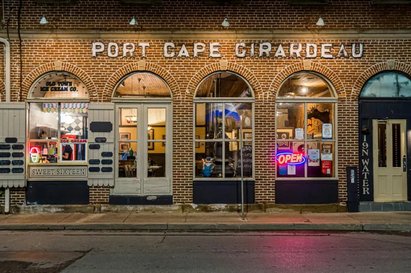 The Alchemy of Shame: How American Towns Transformed Their Darkest Hours into Tourist Gold